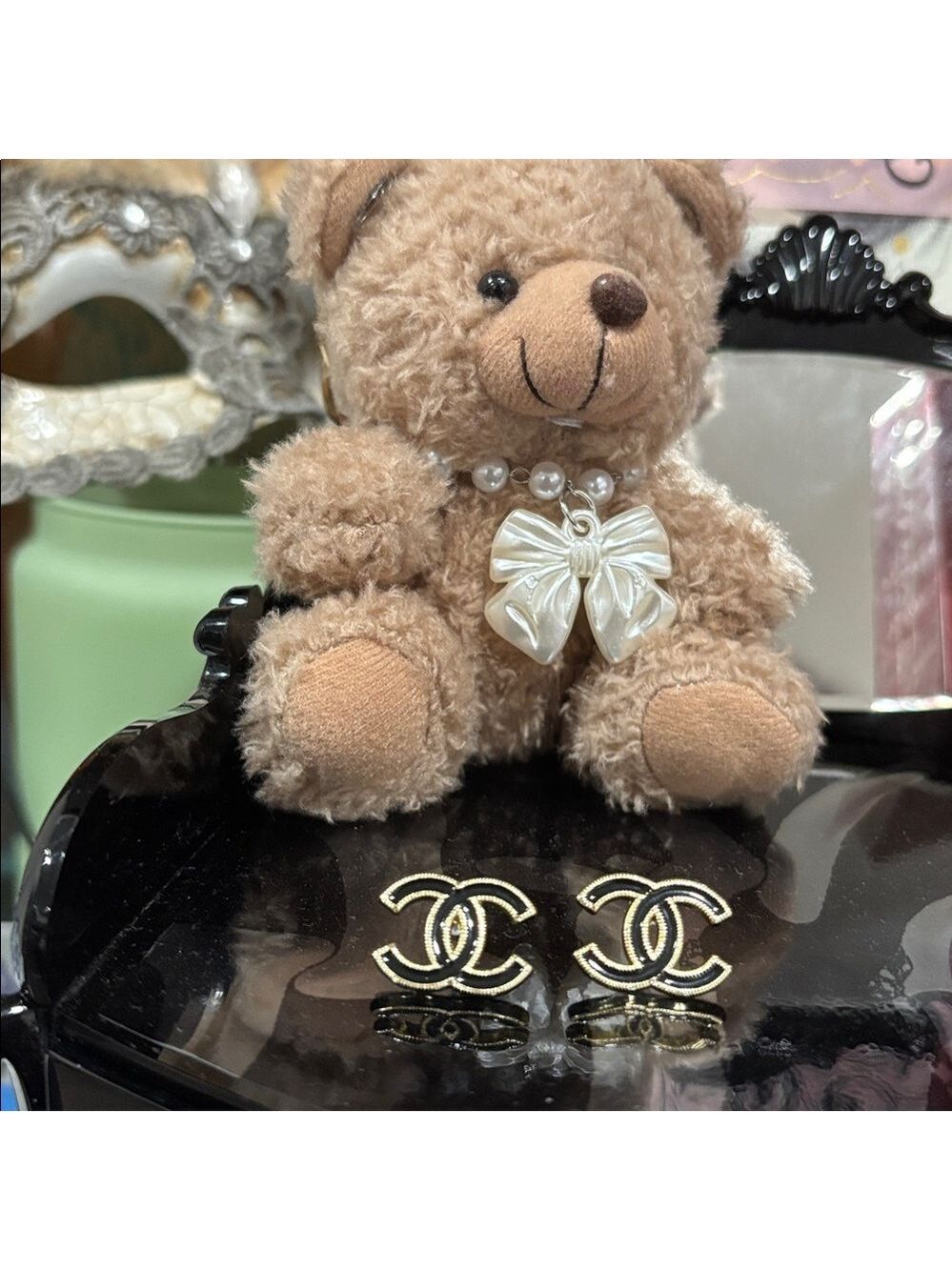 724. CC Black and Gold Stud Earrings